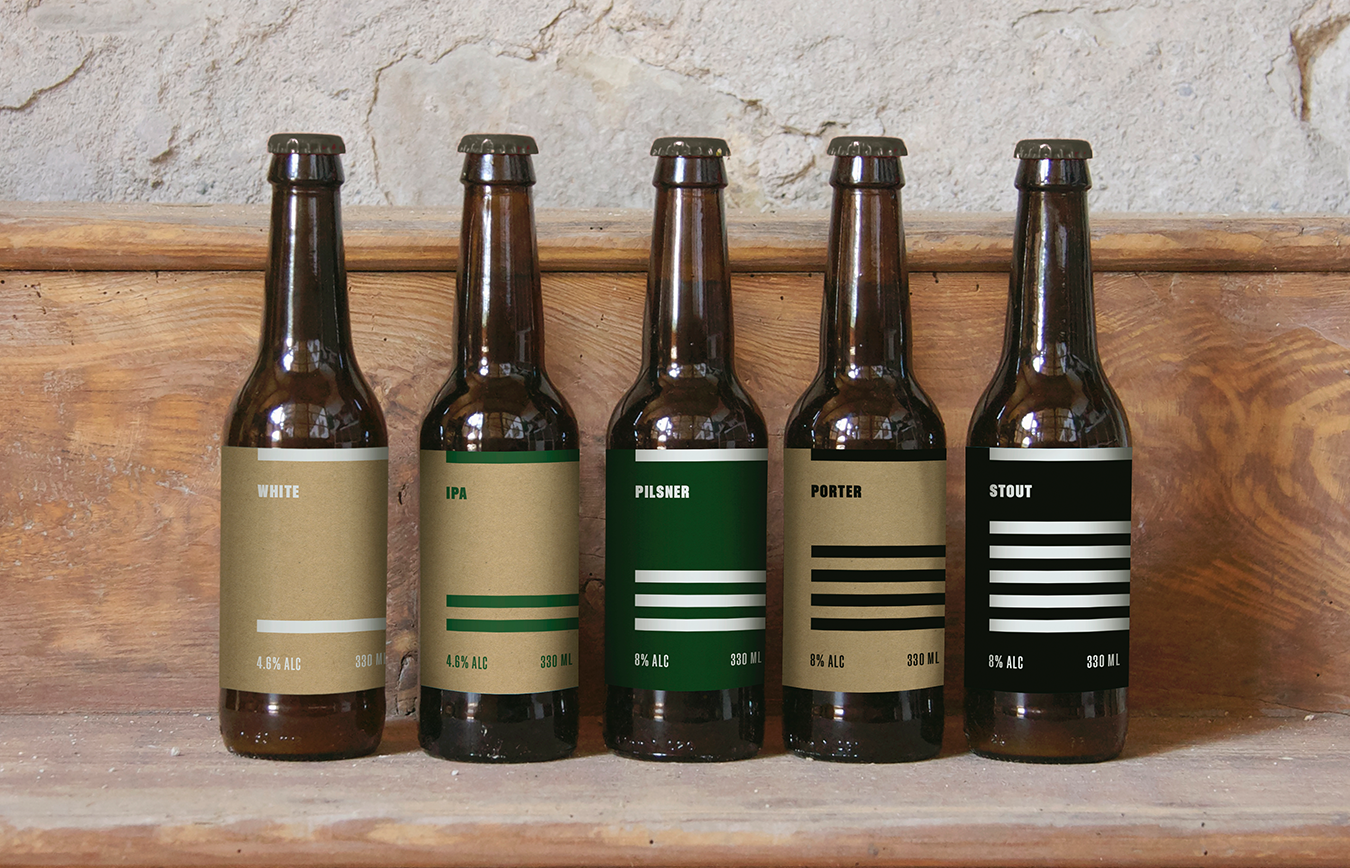 A set of five amber beer bottles modelling a proposed label system for a line of microbrews by Barfly.